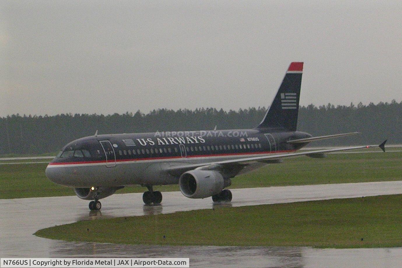 N766US, 2000 Airbus A319-112 C/N 1378, Rainy day at JAX