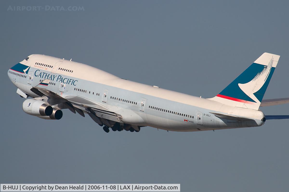 B-HUJ, 1995 Boeing 747-467 C/N 27595, Cathay Pacific B-HUJ (FLT CPA885) climbing out from RWY 25R enroute to Hong Kong Int'l (VHHH).