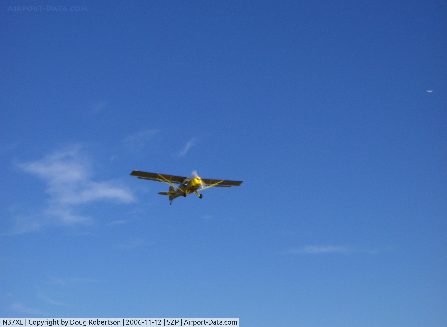 N37XL, 1997 Skystar Kitfox XL C/N BCX002, 1997 Beckett KITFOX XL, Rotax 912 100 Hp, takeoff climbout Runway 22