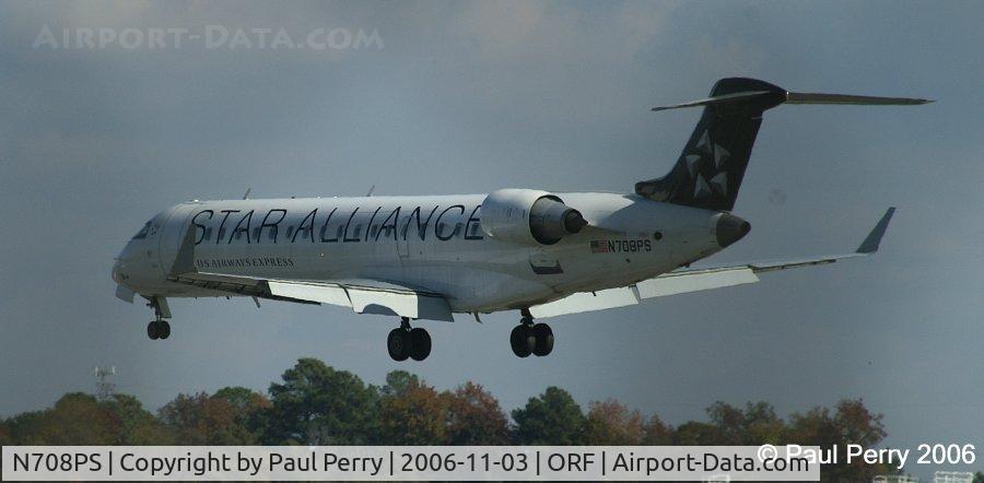 N708PS, 2004 Bombardier CRJ-701 (CL-600-2C10) Regional Jet C/N 10160, Check out the flaps, and the pretty tail.