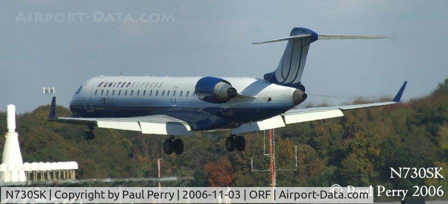 N730SK, 2005 Bombardier CRJ-701 (CL-600-2C10) Regional Jet C/N 10193, Getting ready to smoke those tires