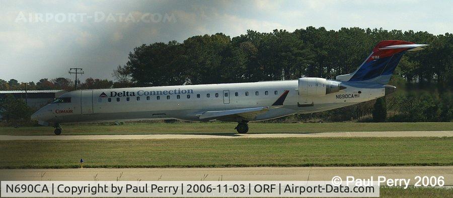 N690CA, 2004 Bombardier CRJ-700 (CL-600-2C10) Regional Jet C/N 10182, Squats on her nosegear like she was on a catapult