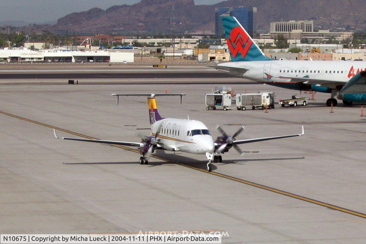 N10675, 1996 Raytheon Aircraft Company 1900D C/N UE-229, Taxiing to the gate