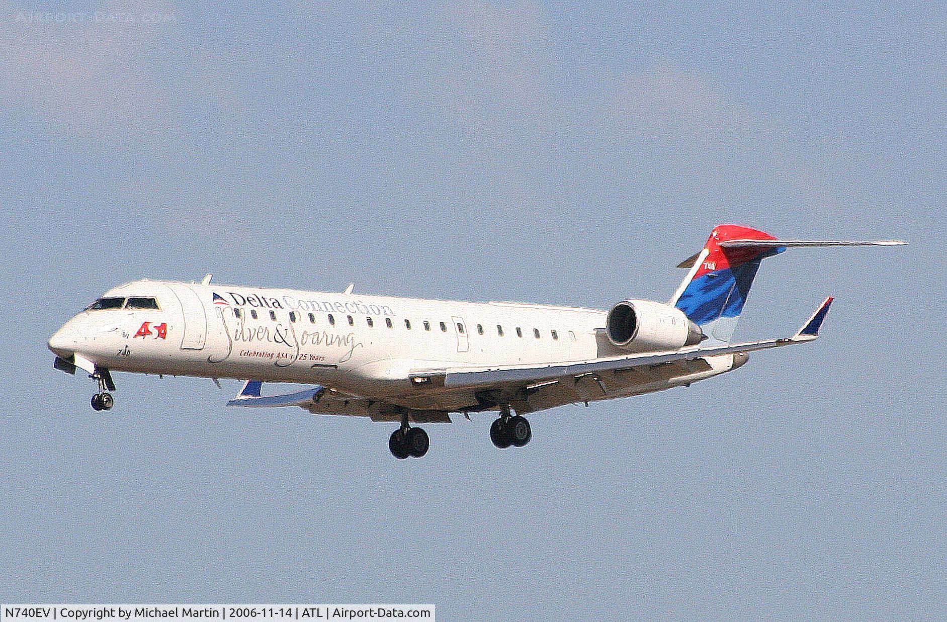 N740EV, 2004 Bombardier CRJ-701 (CL-600-2C10) Regional Jet C/N 10151, On final for Runway 27L