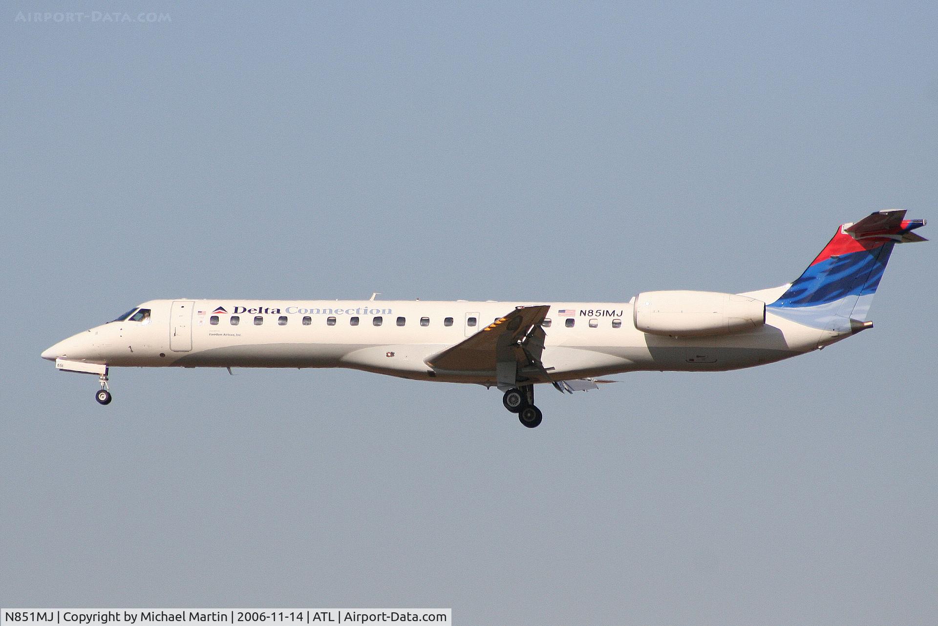 N851MJ, 2002 Embraer EMB-145LR C/N 145572, Over the numbers of 27L