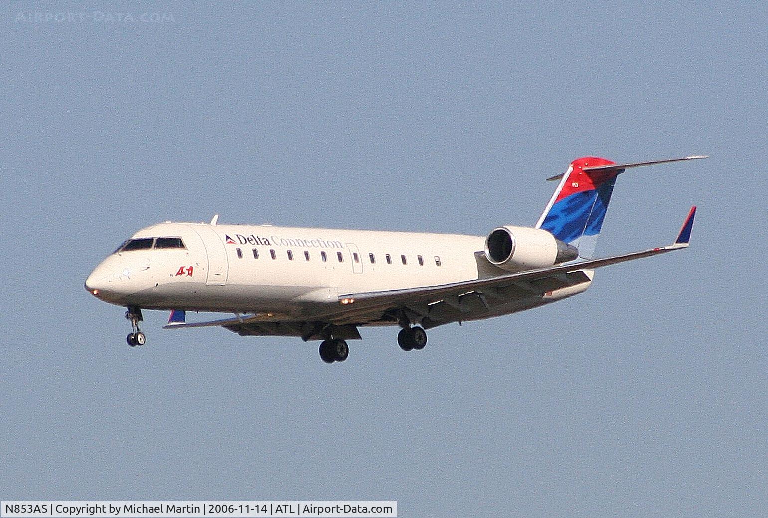N853AS, 2000 Bombardier CRJ-200ER (CL-600-2B19) C/N 7374, On final for Runway 27L