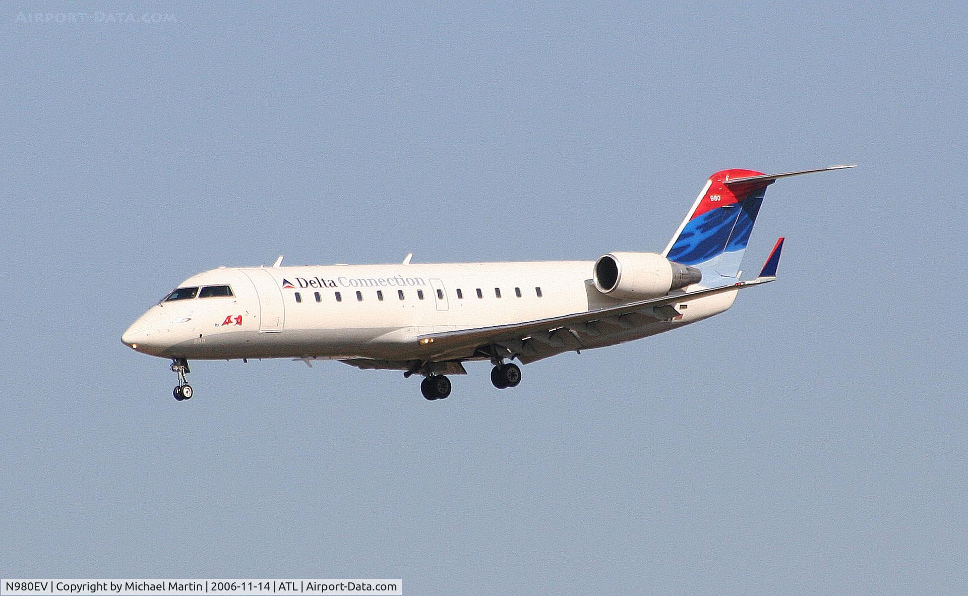 N980EV, 2003 Bombardier CRJ-200ER (CL-600-2B19) C/N 7759, On final for Runway 27L