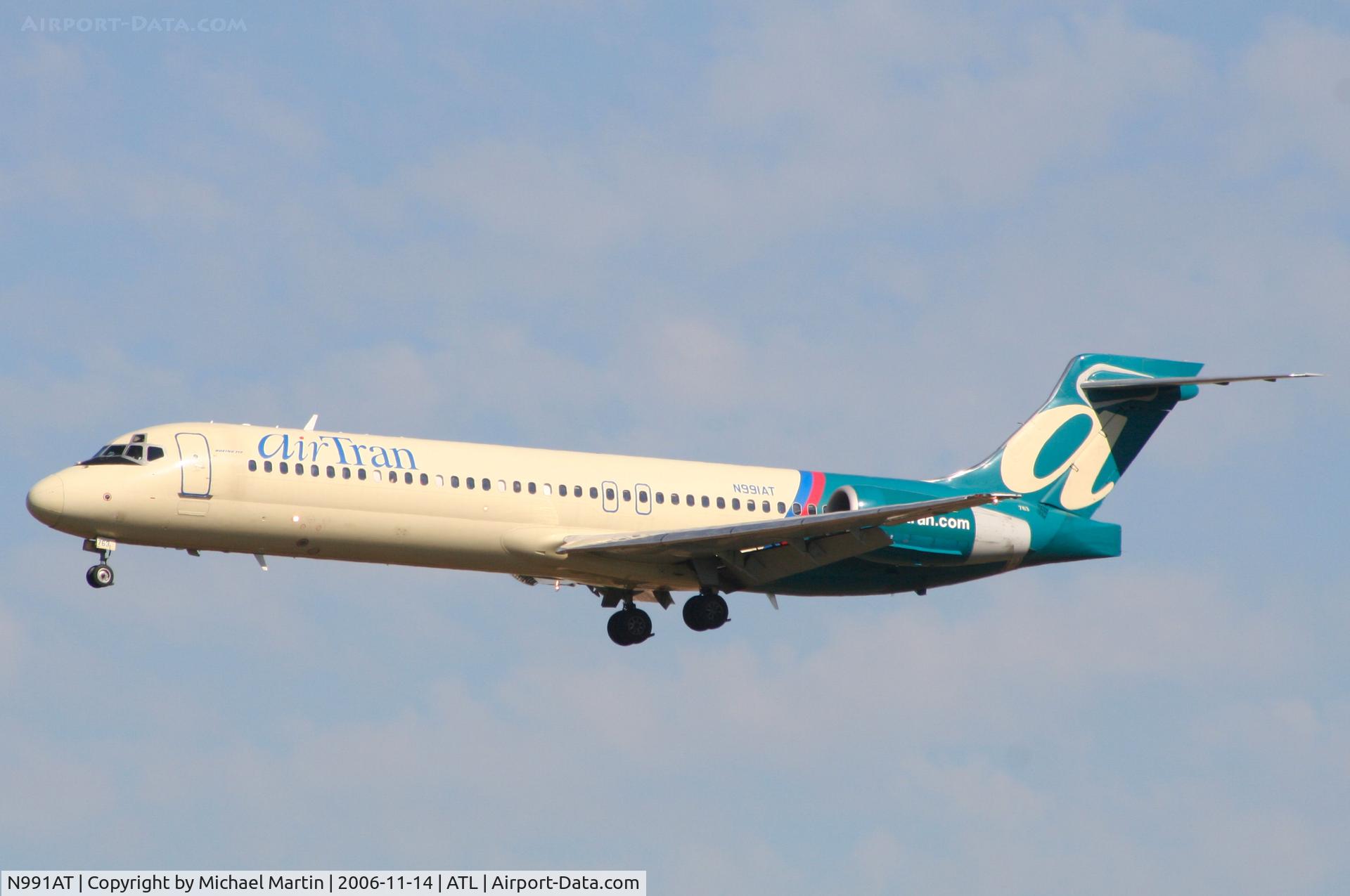 N991AT, 2002 Boeing 717-200 C/N 55135, On final for Runway 27L