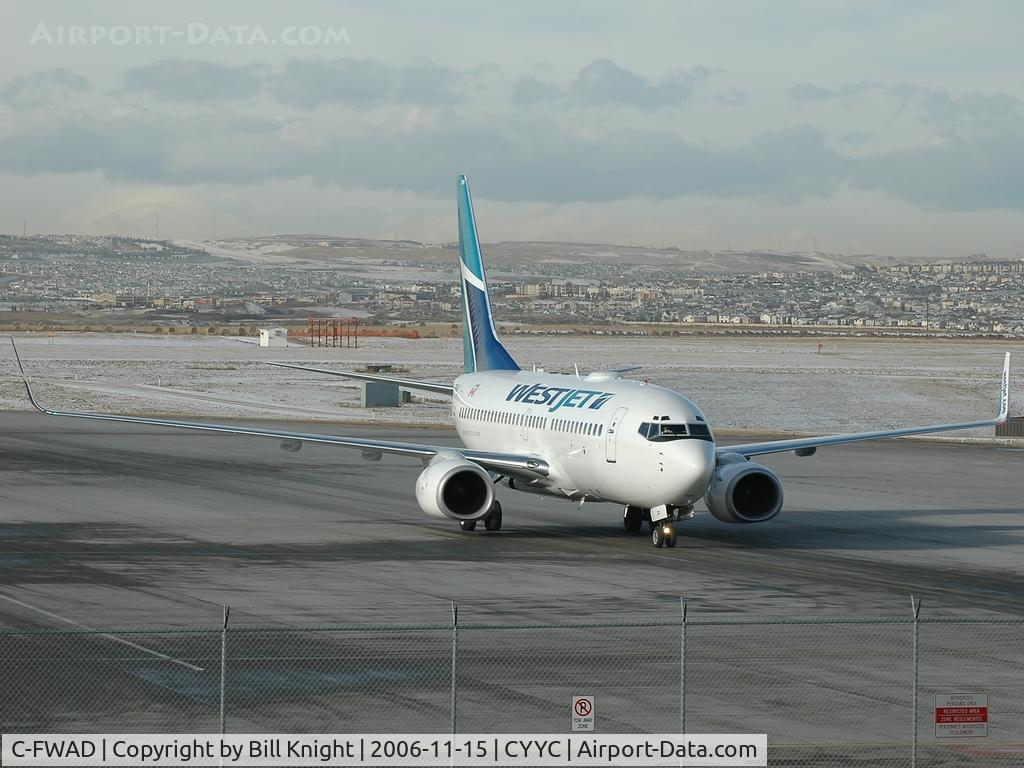 C-FWAD, 2002 Boeing 737-7CT C/N 32753, Pulling up to gate