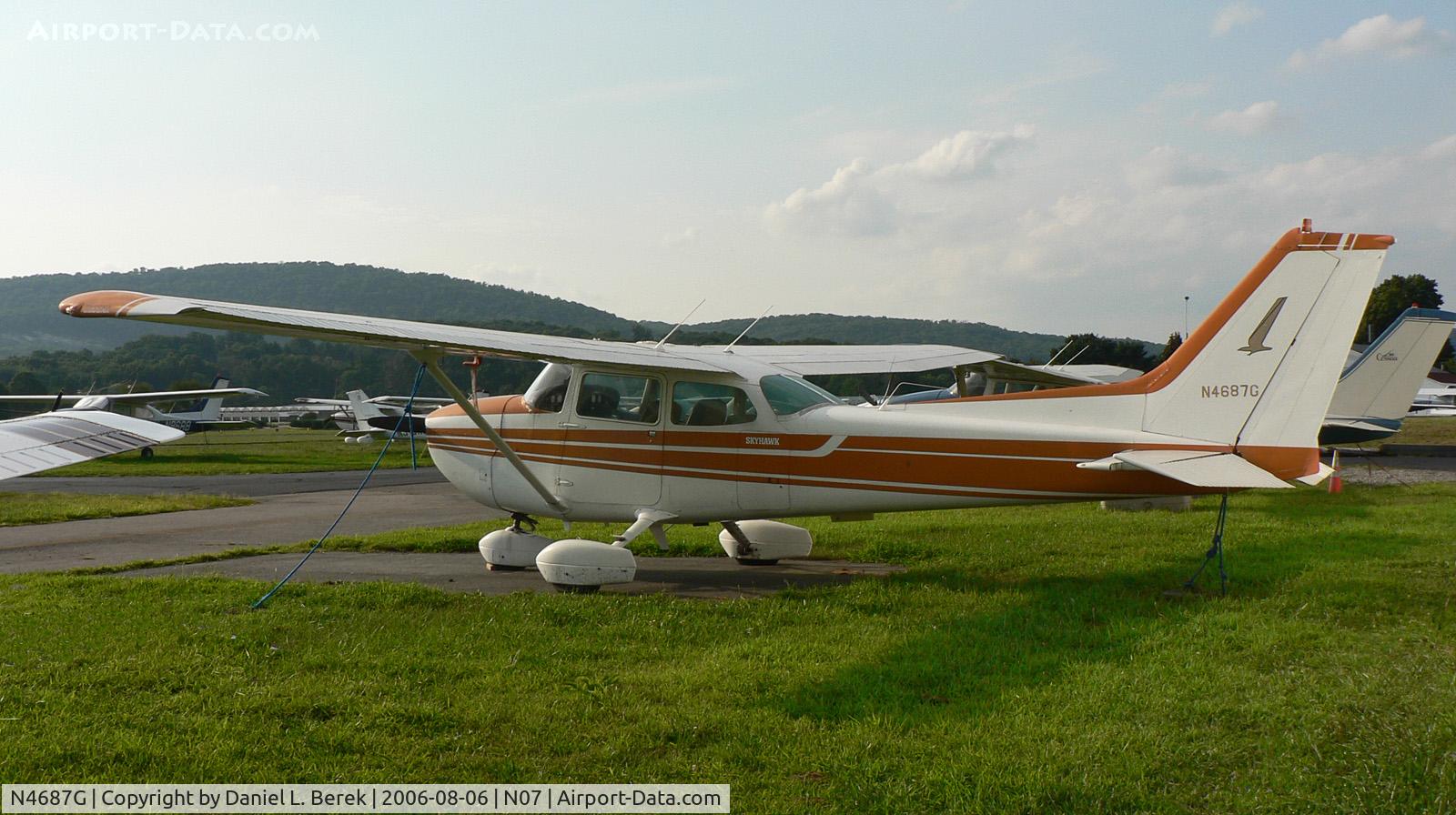 N4687G, Cessna 172N C/N 17273313, Slightly faded Skyhawk basks in the hot summer sun at Lincoln Park Airport.