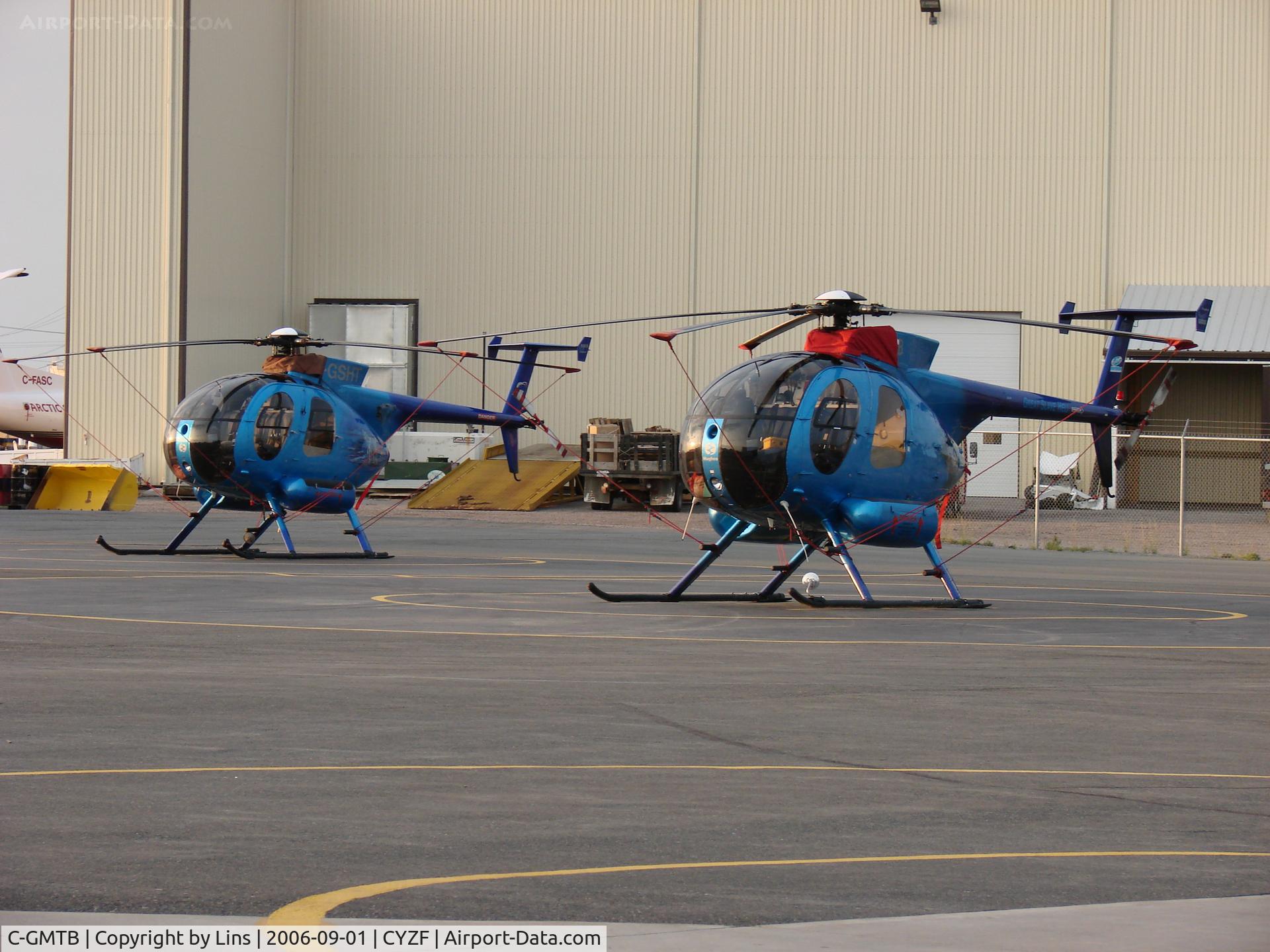 C-GMTB, 1981 Hughes 369D C/N 310918D, MTB In Foreground, With SHT In Background