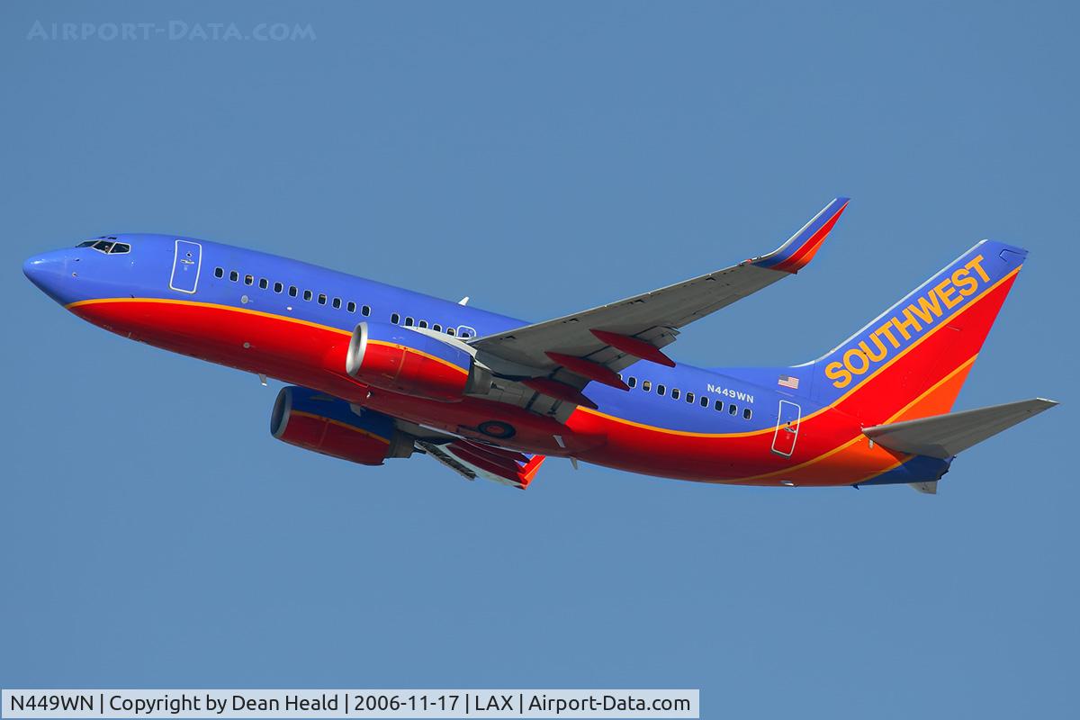 N449WN, 2003 Boeing 737-7H4 C/N 32469, Southwest Airlines N449WN (FLT SWA2452) climbing out from RWY 25R enroute to Tucson Int'l (KTUS).