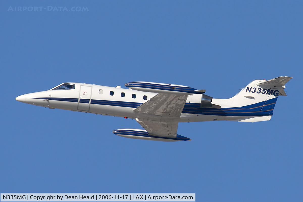 N335MG, 1987 Gates Learjet 35A C/N 626, Milts Eagle LLC N335MG climbing out from RWY 25R enroute to Las Vegas McCarran Int'l (KLAS).