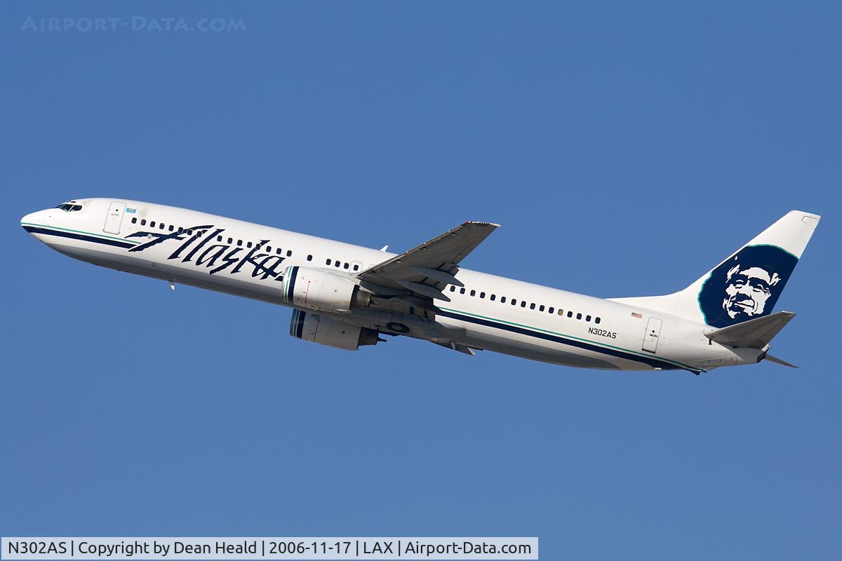 N302AS, 2003 Boeing 737-990 C/N 30017, Alaska Airlines N302AS (FLT ASA292) climbing out from RWY 25R enroute to Los Cabos Int'l (MMSD).