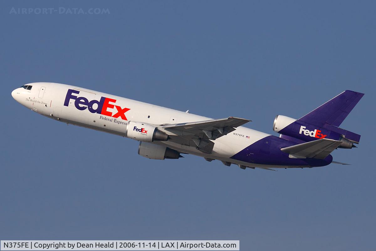 N375FE, 1972 McDonnell Douglas MD-10-10F C/N 46613, FedEx N375FE (FLT FDX3019) climbing out from RWY 25R enroute to Chicago O'Hare Int'l (KORD).