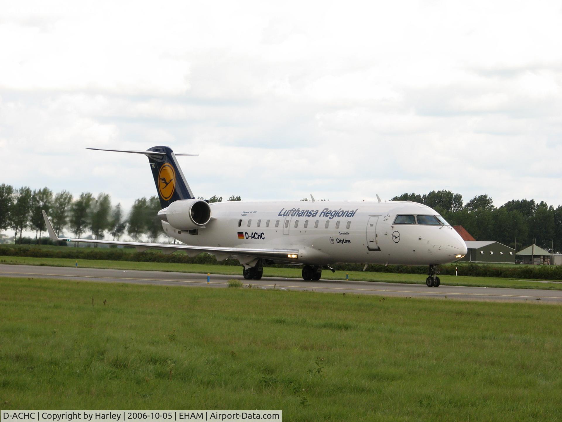 D-ACHC, 2000 Canadair CRJ-200LR (CL-600-2B19) C/N 7394, taxiing at EHAM after landing on 18R