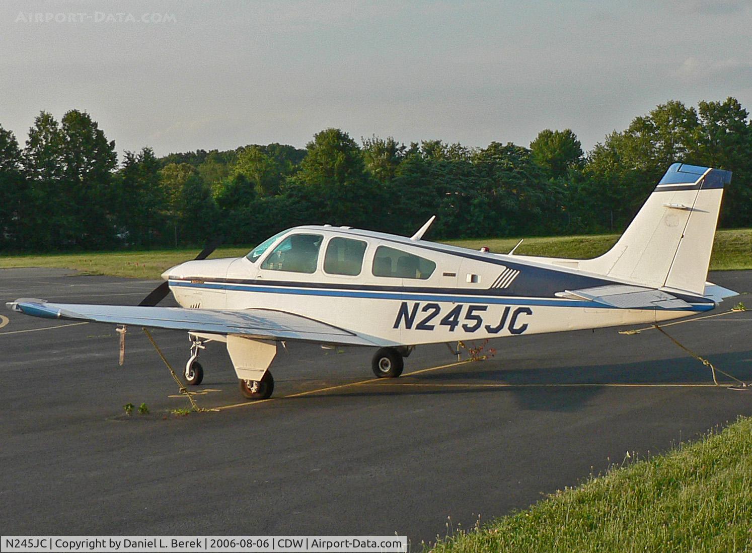 N245JC, 1975 Beech F33A Bonanza C/N CE-595, Well-dressed Bonanza soaks in a sultry summer evening at Caldwell.