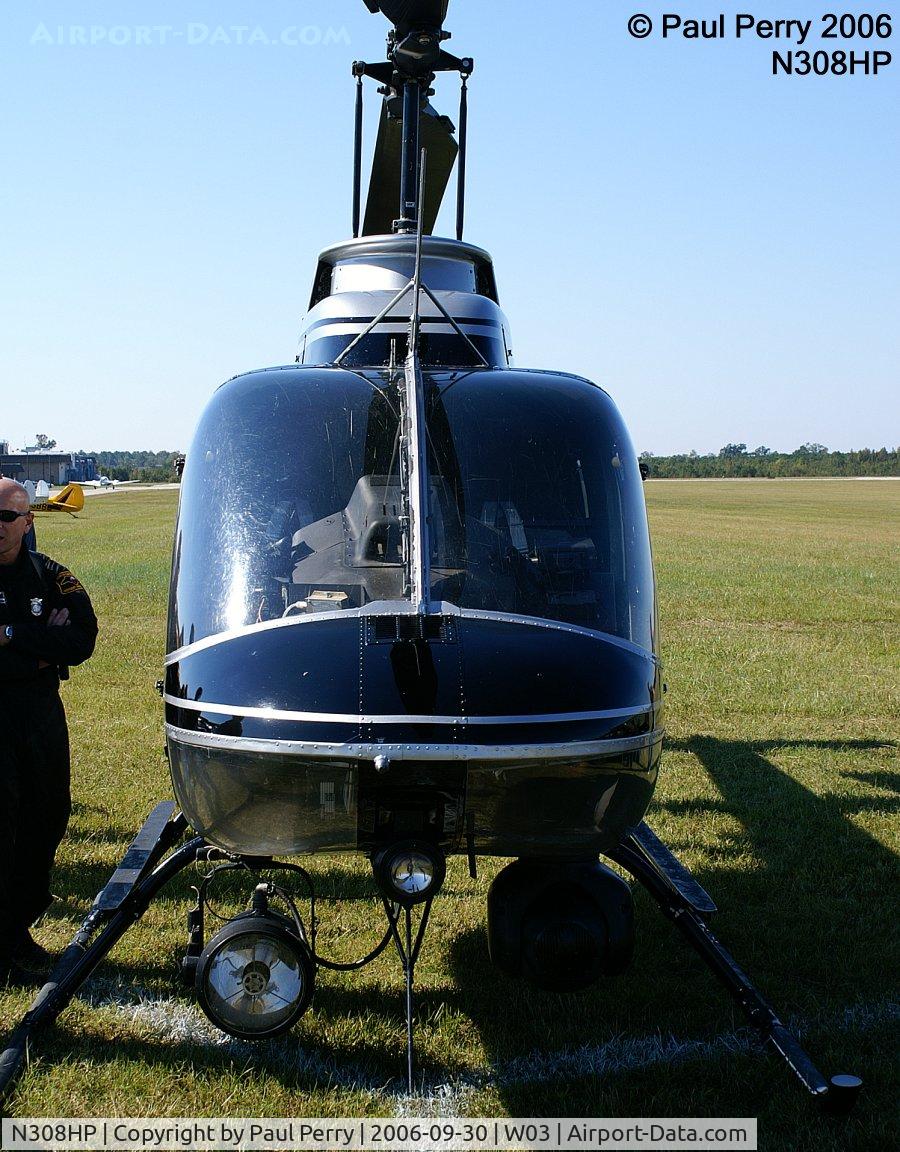 N308HP, Bell OH-58A Kiowa C/N 71-20764, Head on with the North Carolina State Patrol helo
