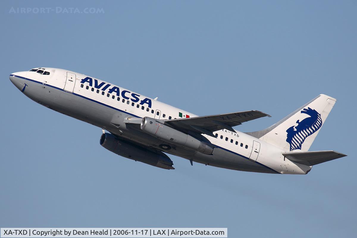 XA-TXD, 1980 Boeing 737-201 C/N 22018, Consorcio Aviaxsa, S.A. de C.V., Aviacsa XA-TXD (FLT CHP791) climbing out from RWY 25R enroute to General Mariano Escobedo Int'l (MMMY).