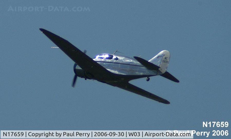 N17659, 1940 Spartan 7W Executive C/N 22, Airborne, and wheels in the wells.  Perhaps northbound to Ohio?