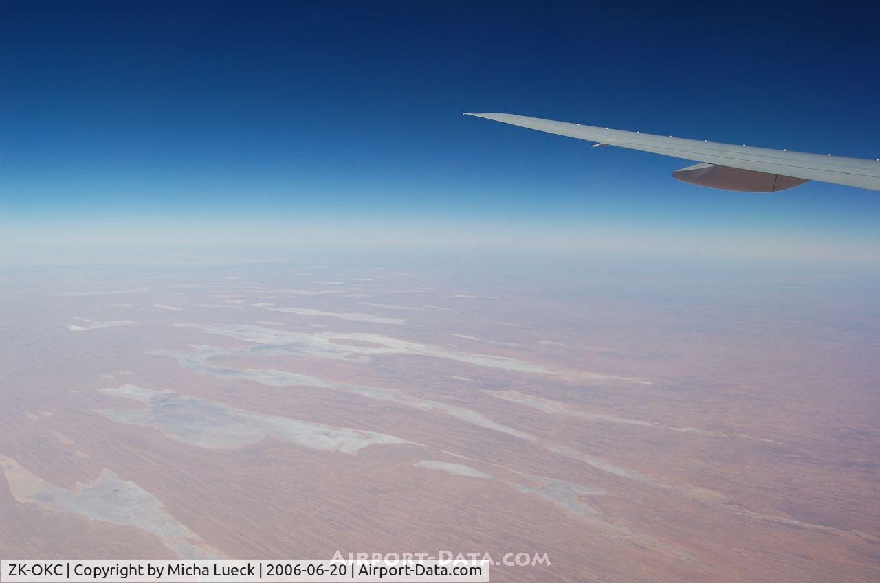 ZK-OKC, 2006 Boeing 777-219/ER C/N 34377, lots of red earth in Australia's Outback