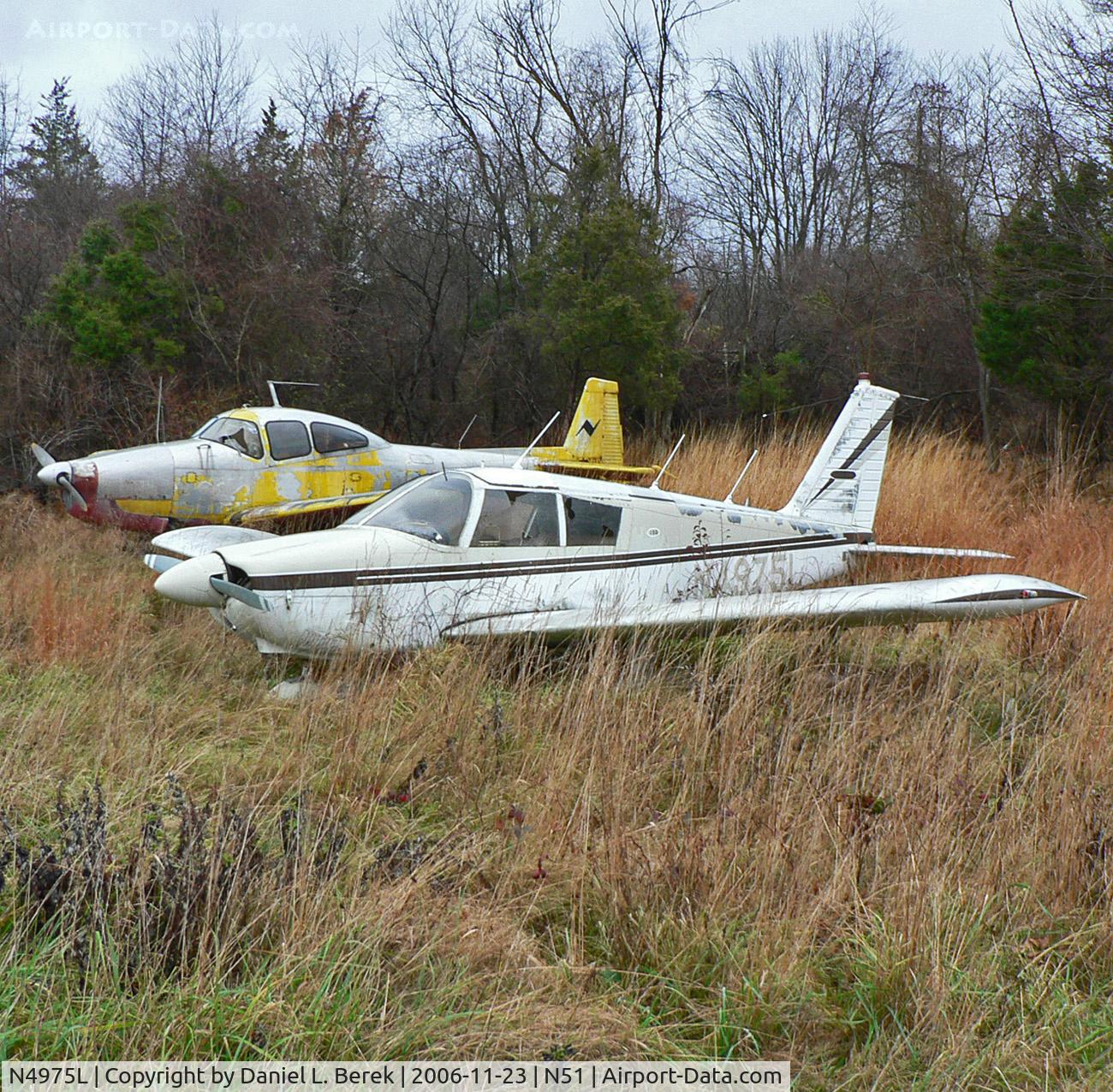 N4975L, 1967 Piper PA-28-180 C/N 28-4349, With a 1947 Navion A for company, this 1967 Piper Archer assumes its place in formation in Solberg's corrosion corner.