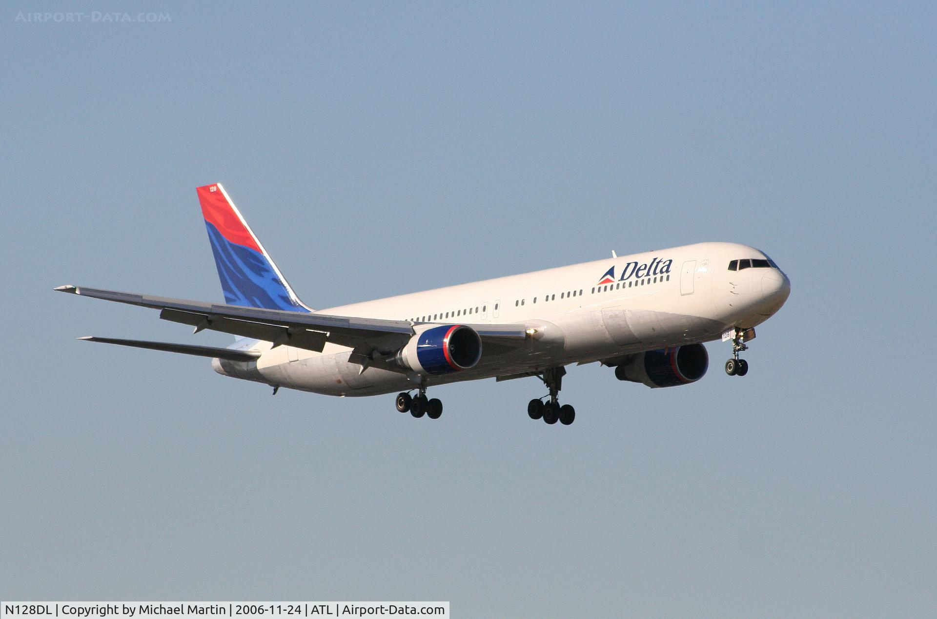 N128DL, 1988 Boeing 767-332 C/N 24078, On final for Runway 9R
