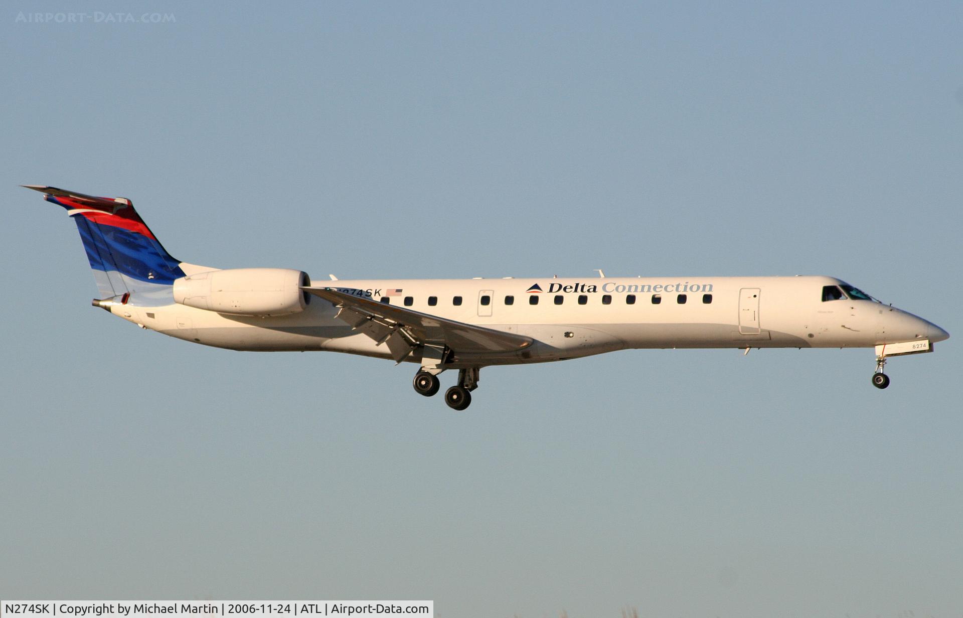 N274SK, 2000 Embraer EMB-145LR C/N 145344, Over the numbers of 9R