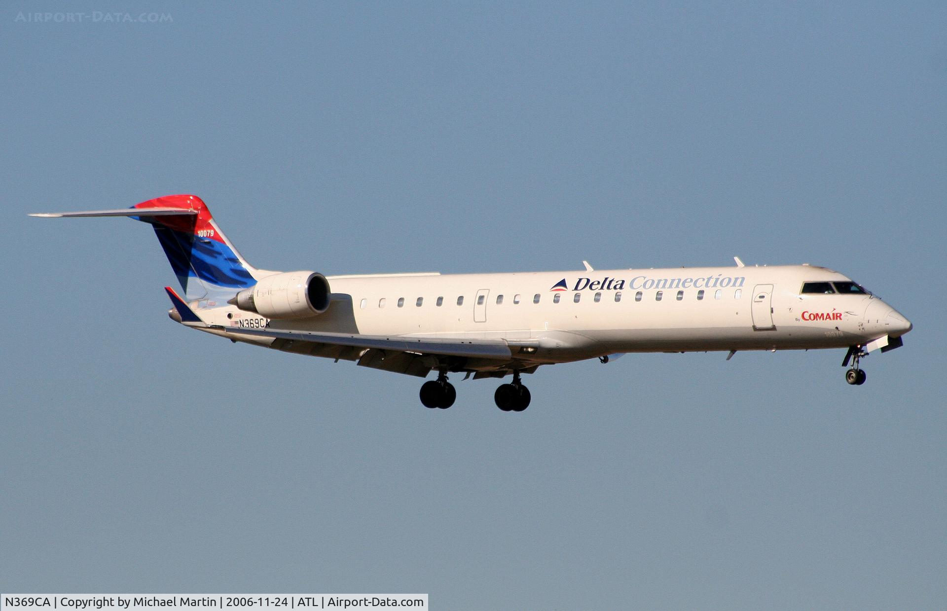 N369CA, 2003 Canadair CL-600-2C10 Regional Jet CRJ-701ER C/N 10079, On final for Runway 9R