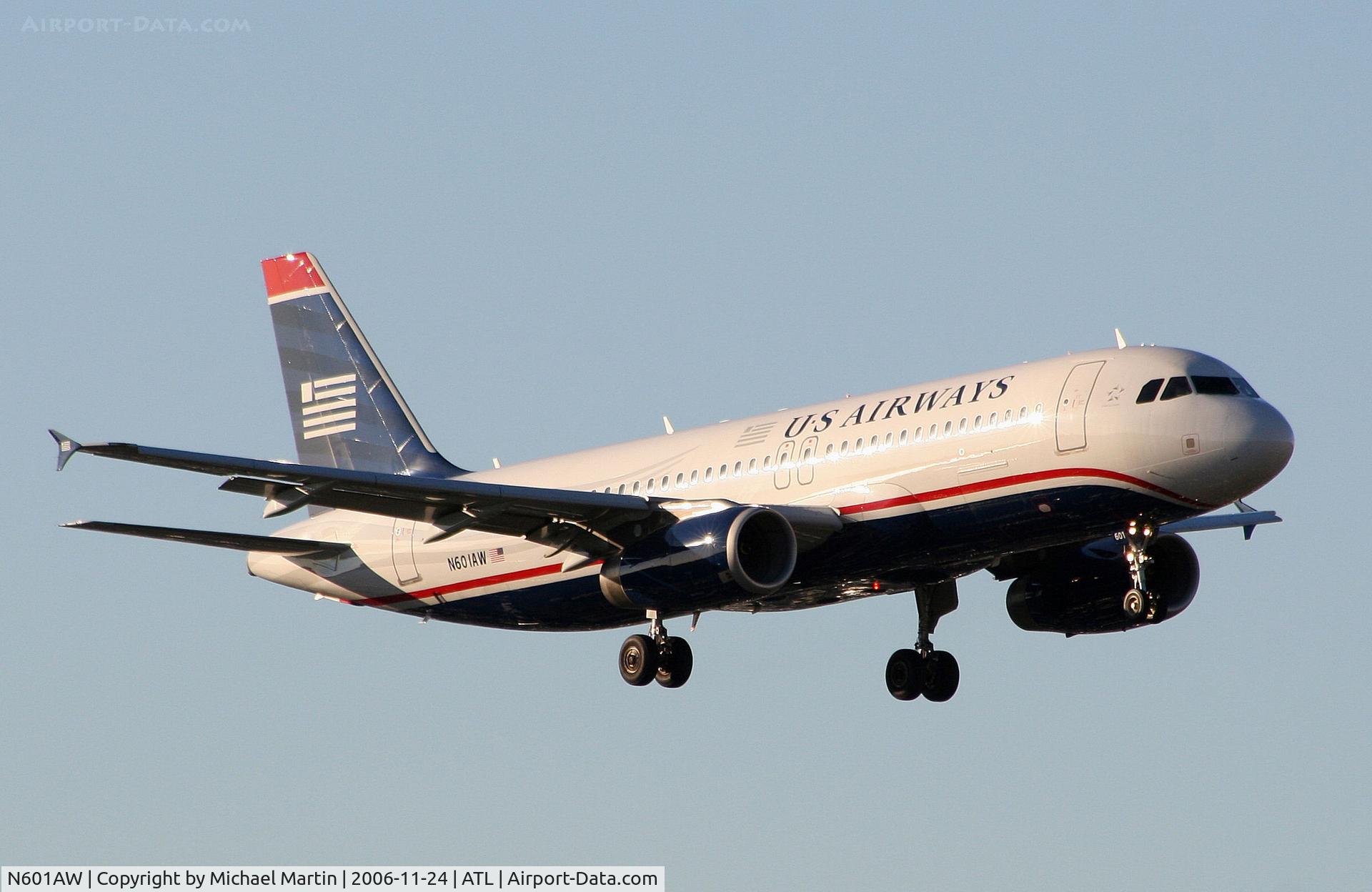 N601AW, 2003 Airbus A320-232 C/N 1935, On final for Runway 9R
