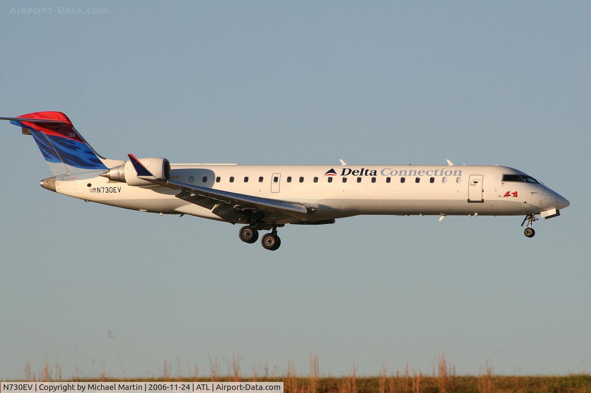 N730EV, 2004 Bombardier CRJ-701 (CL-600-2C10) Regional Jet C/N 10141, Over the numbers of 9R