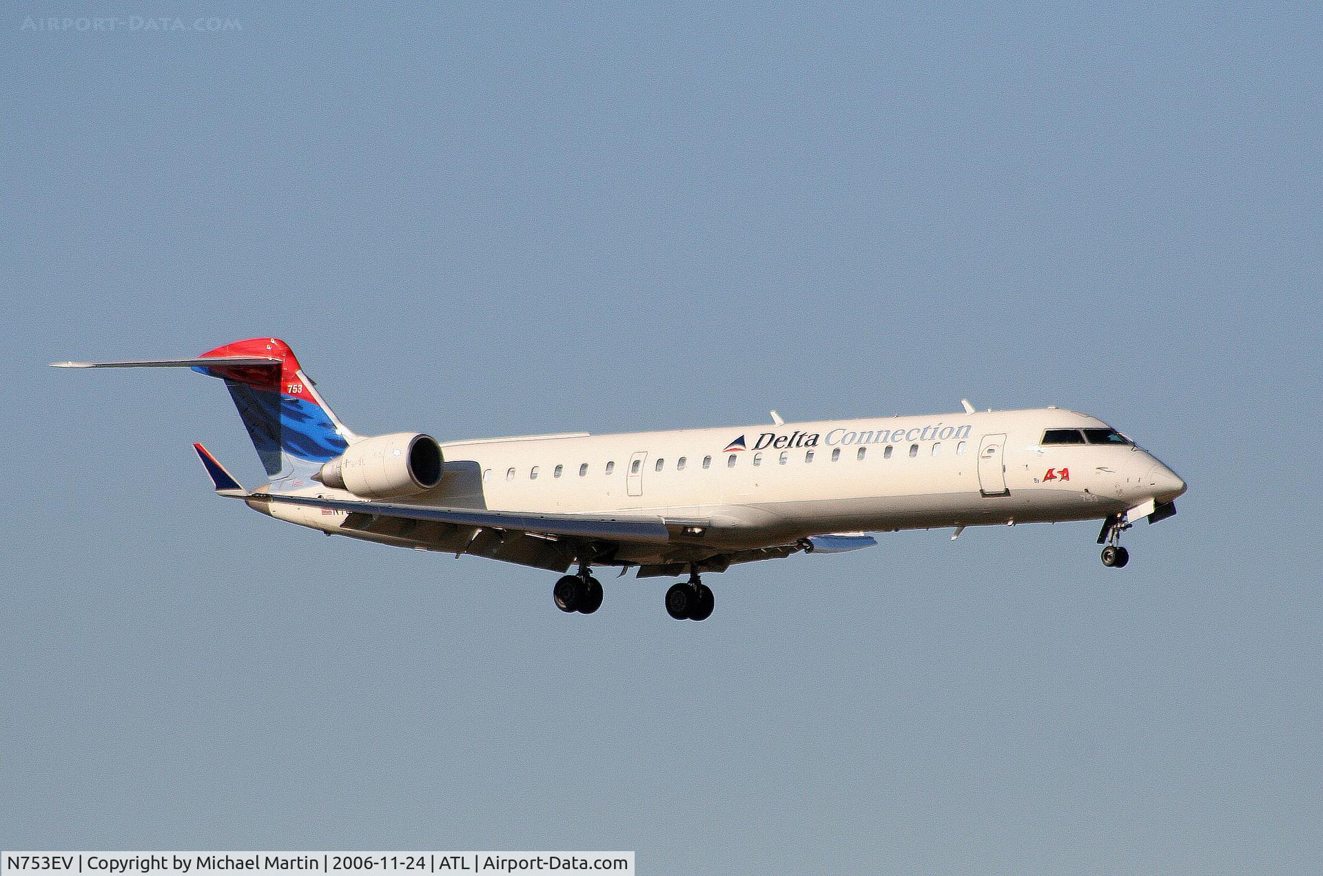 N753EV, 2004 Bombardier CRJ-701 (CL-600-2C10) Regional Jet C/N 10169, On final for Runway 9R