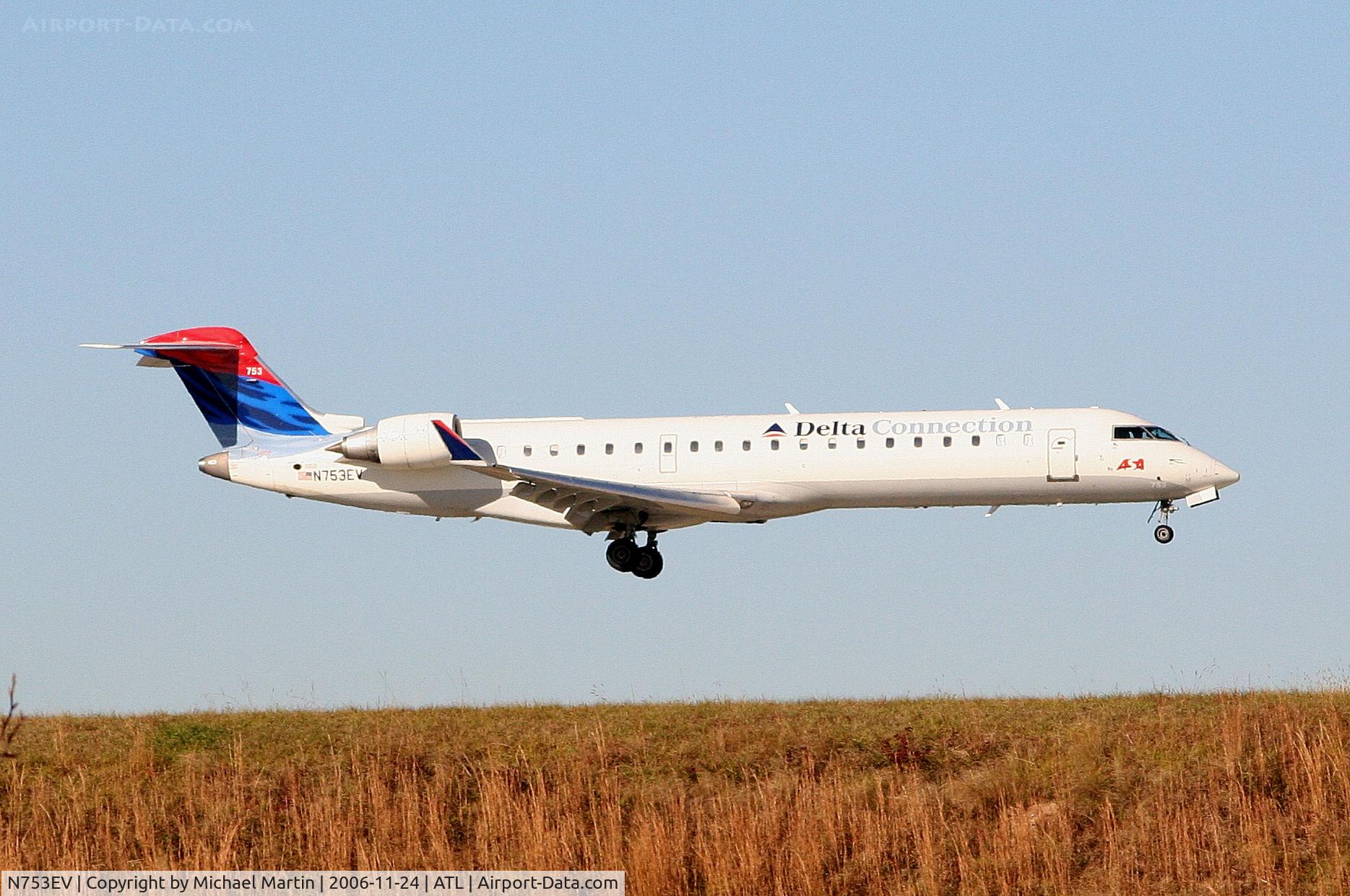 N753EV, 2004 Bombardier CRJ-701 (CL-600-2C10) Regional Jet C/N 10169, Over the numbers of 9R