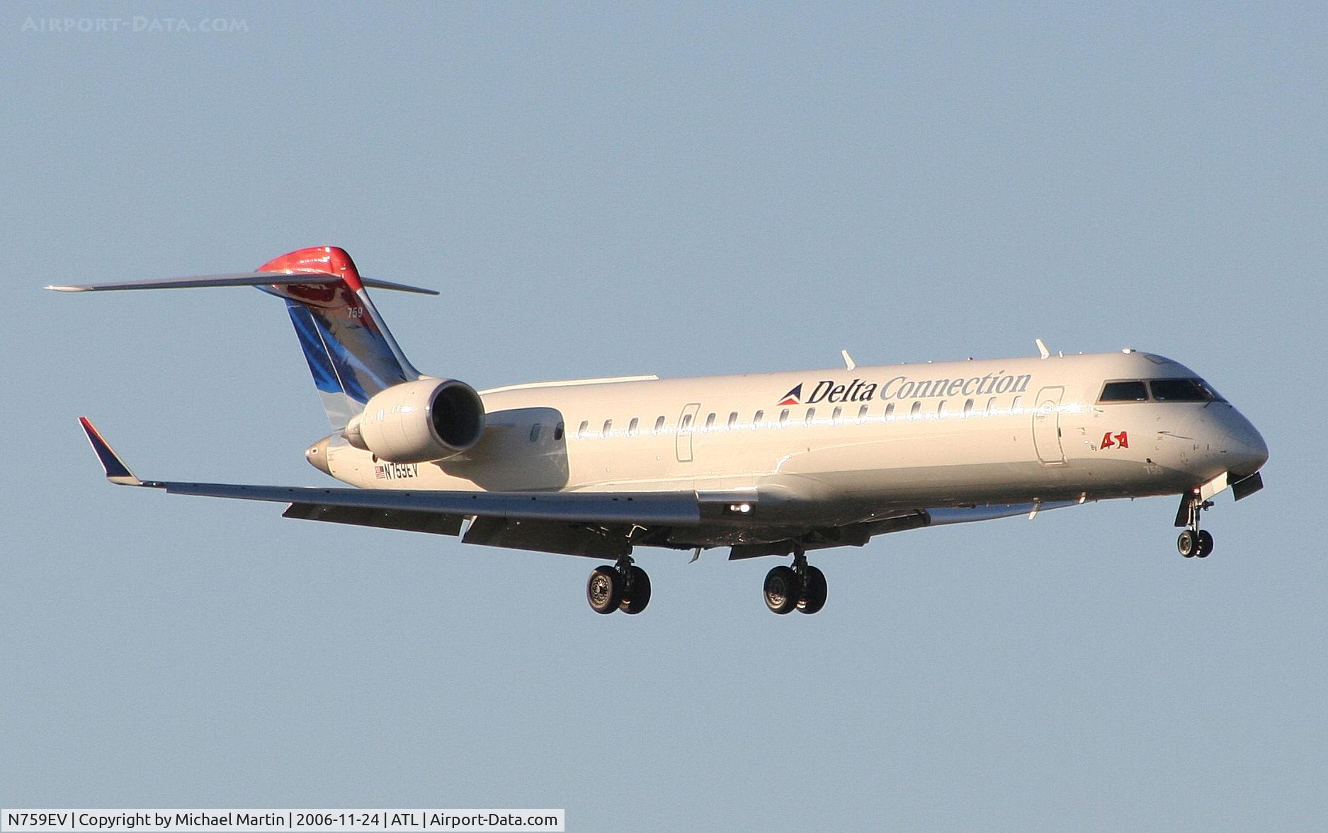 N759EV, 2005 Bombardier CRJ-700 (CL-600-2C10) Regional Jet C/N 10211, On final for Runway 9R