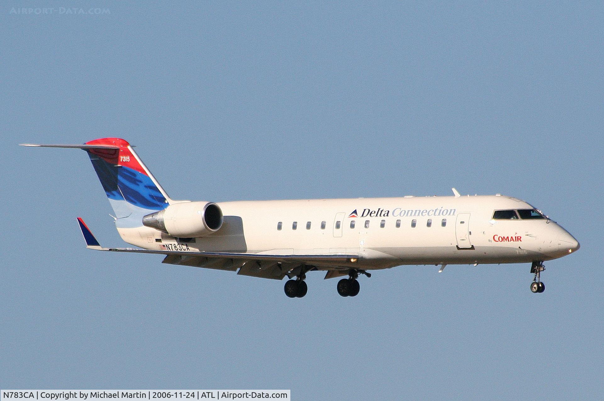 N783CA, Bombardier CRJ-100ER (CL-600-2B19) C/N 7315, On final for Runway 9R