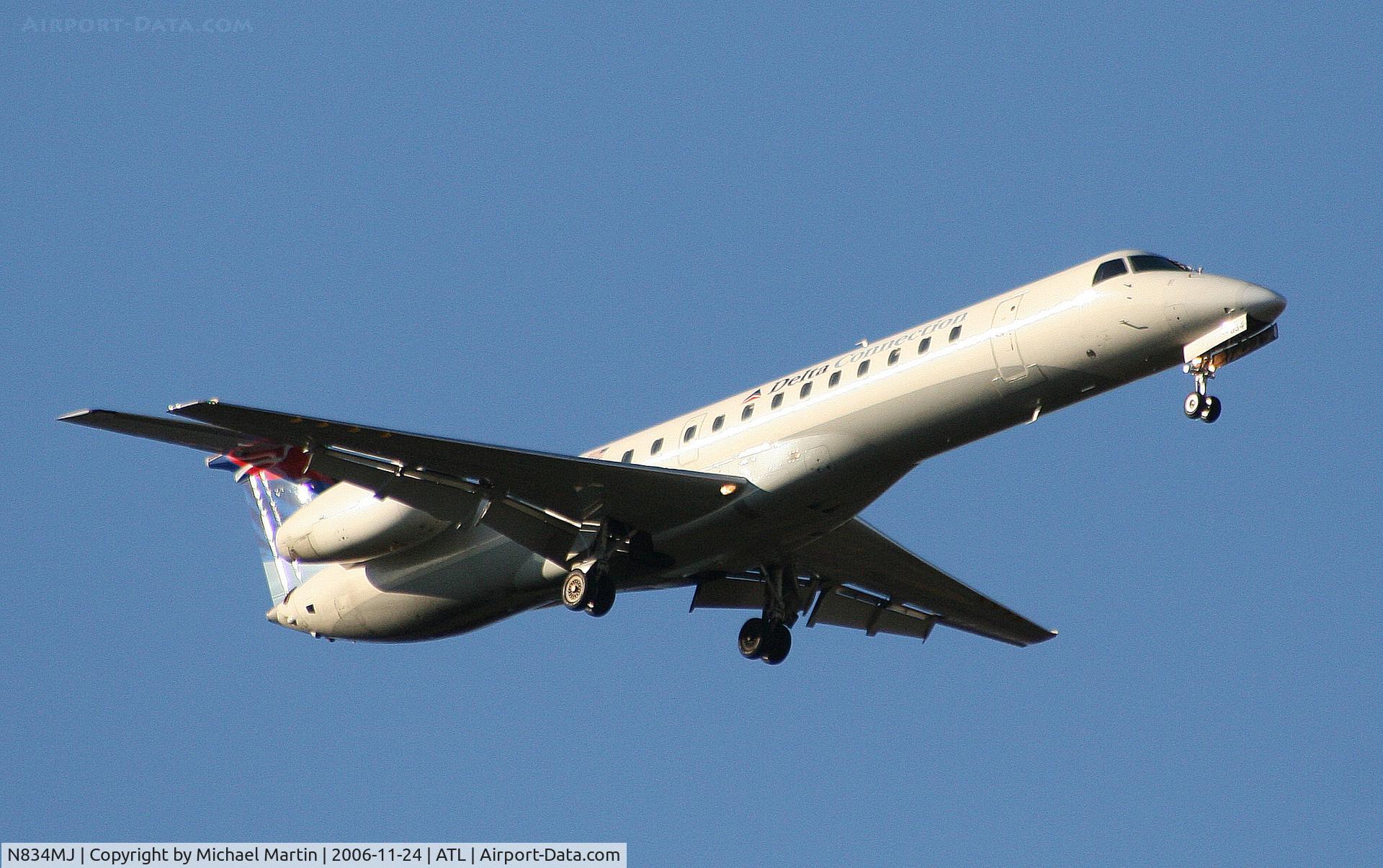 N834MJ, 2000 Embraer EMB-145LR C/N 145340, On final for Runway 9R