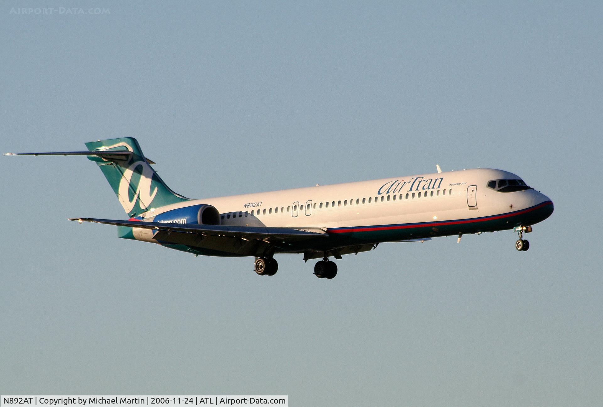 N892AT, 2004 Boeing 717-200 C/N 55044, On final for Runway 9R