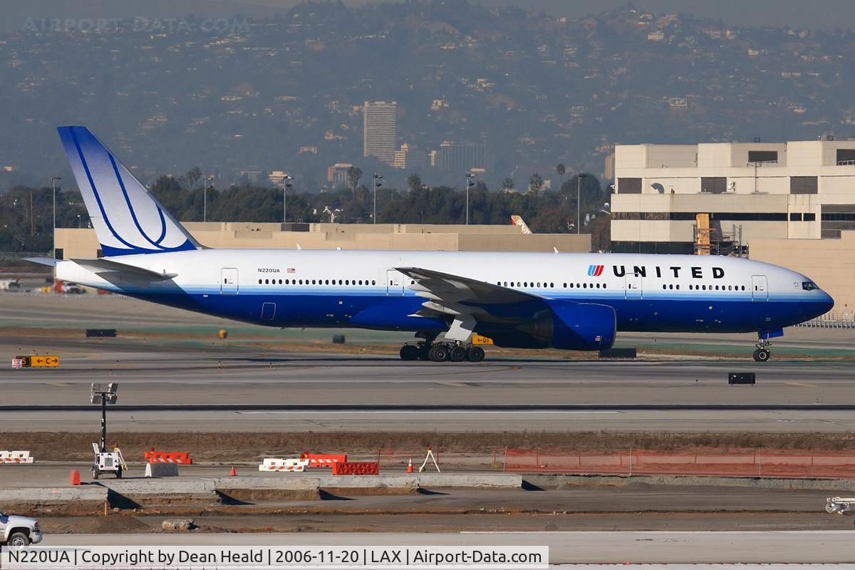 N220UA, 2001 Boeing 777-222 C/N 30223, United Airlines N220UA (FLT UAL935) from London Heathrow (EGLL) taxiing to Terminal 7 after arrival on the north complex.