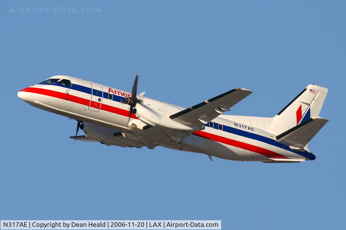 N317AE, 1992 Saab 340B C/N 340B-317, American Eagle N317AE (FLT EGF91) climbing out from RWY 25R enroute to San Diego Int'l (KSAN).