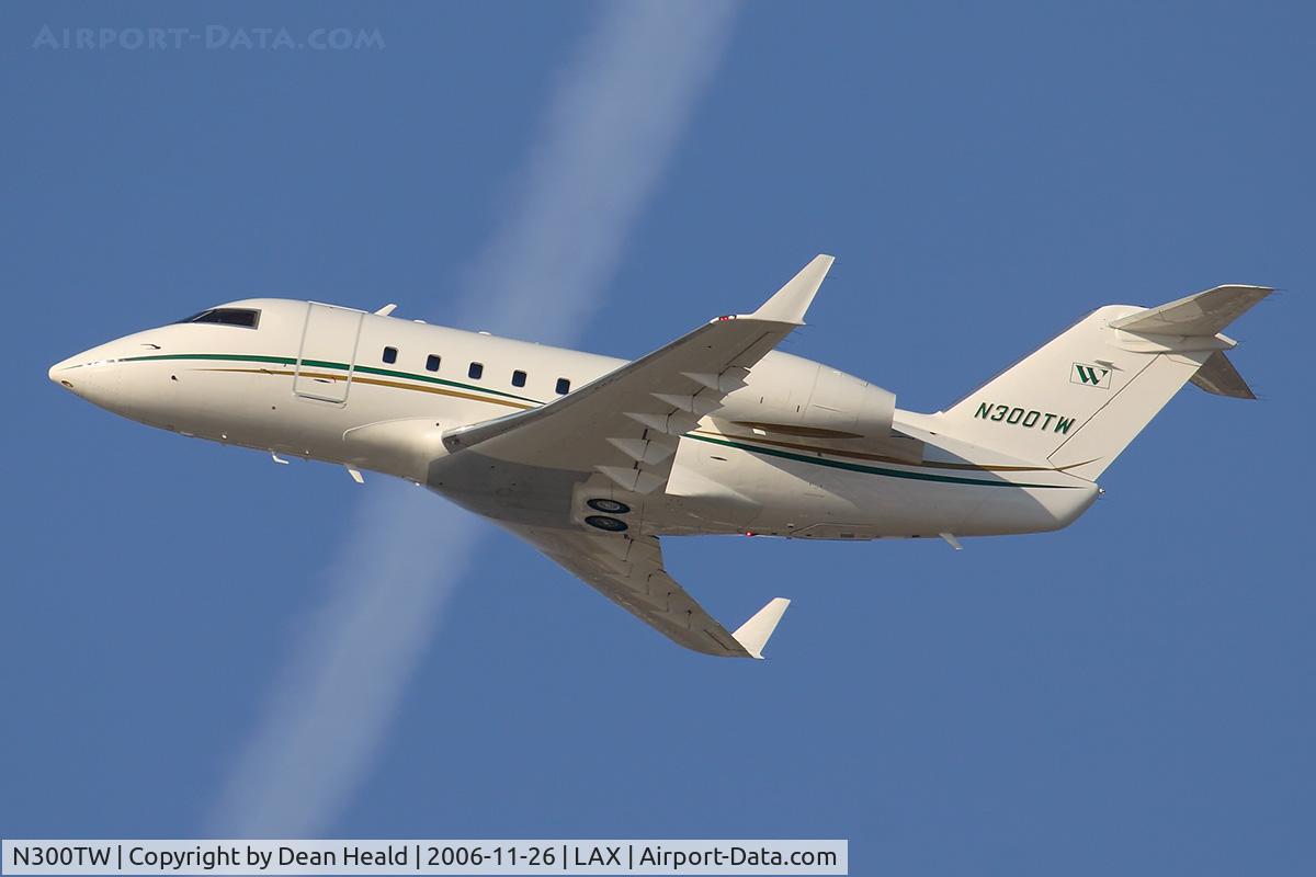N300TW, 1999 Bombardier Challenger 604 (CL-600-2B16) C/N 5428, 1983 Challenger N300TW climbing out from RWY 25R enroute to Montgomery Regional (KMGM).