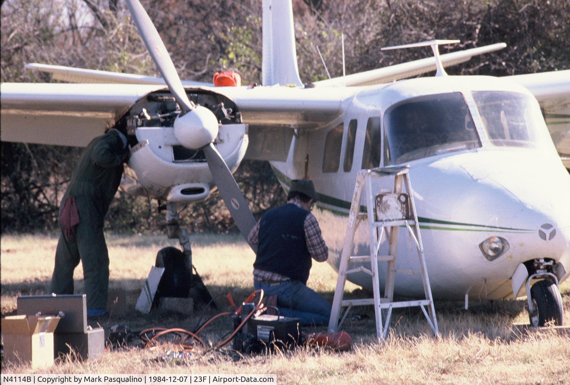 N4114B, 1952 Aero Commander 520 C/N 520-15, Aero Commander 520   Aircraft mechanics working on aircraft that had not flown in years for ferry flight.