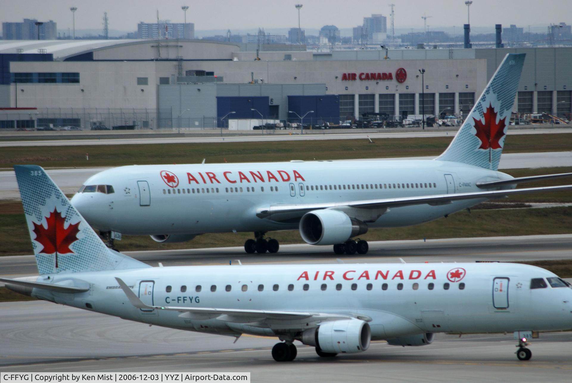 C-FFYG, 2005 Embraer 175SU (ERJ-170-200SU) C/N 17000116, C-FFYG with C-FXMC (767-333) waiting behind