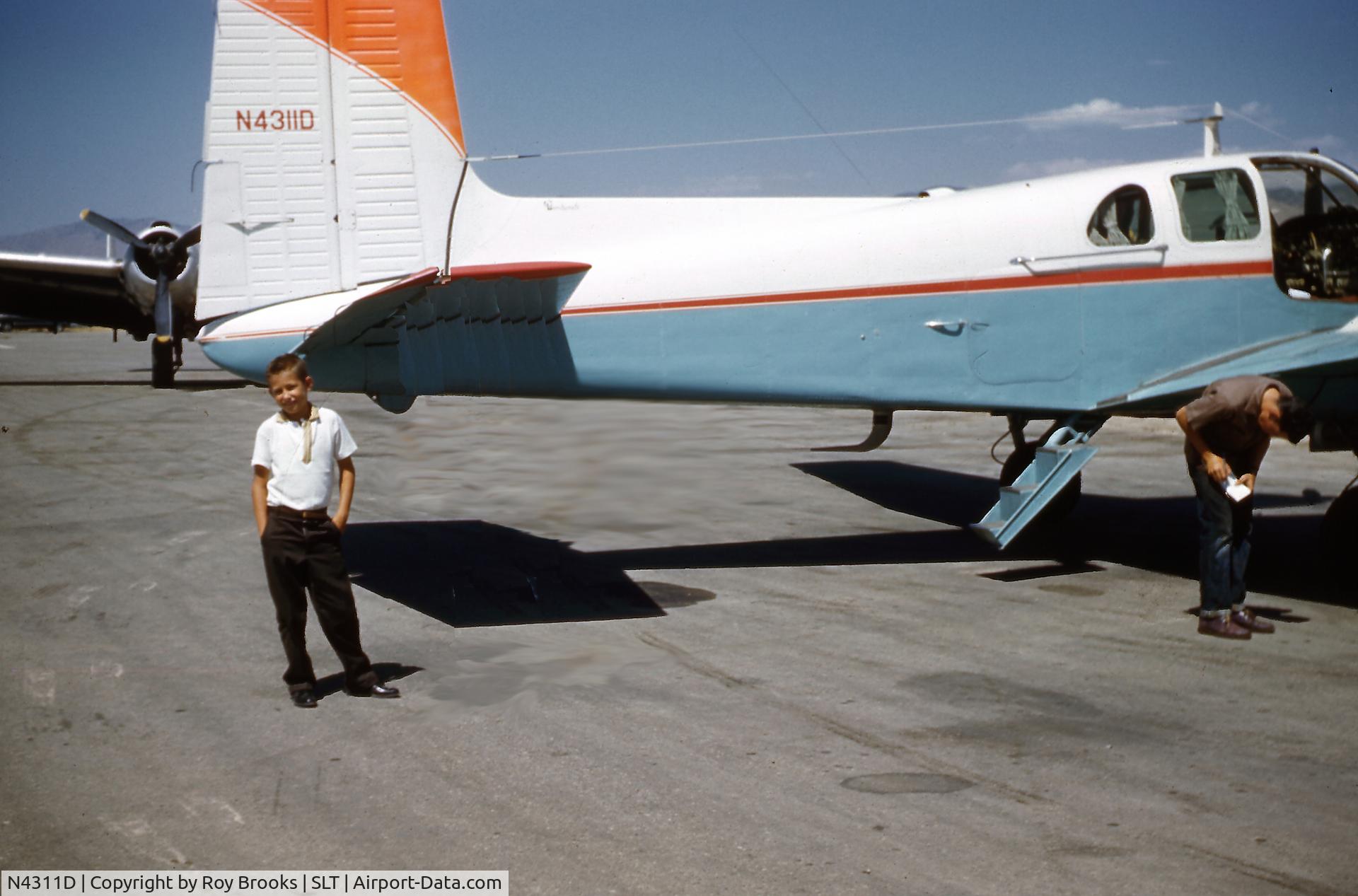 N4311D, 1956 Beech D50 Twin Bonanza C/N DH-64, Excaliber Twin Bonanza. Me at age 9 on a trip with my father. My dad flew this airplane extensively across the US for El Paso Natural Gas Co.