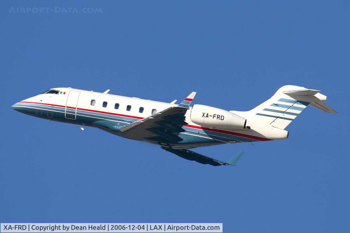 XA-FRD, Canadair Challenger 300 (BD-100-1A10) C/N 20078, A nice-looking Canadair Challenger 300 climbing out from RWY 25R.