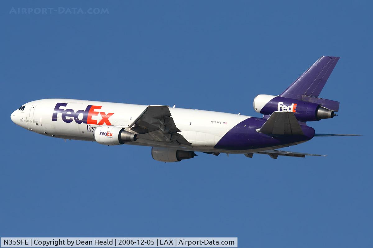 N359FE, 1980 McDonnell Douglas MD-10-10F C/N 46635, FedEx N359FE (FLT FDX3019) climbing out from RWY 25R enroute to Chicago O'Hare Int'l (KORD).  Note that the 'x' in FedEx on the tail is missing.