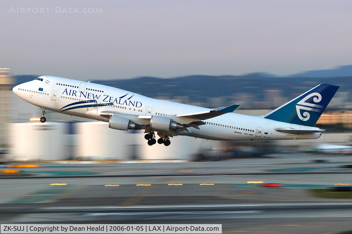 ZK-SUJ, 1998 Boeing 747-4F6 C/N 27602, Air New Zealand ZK-SUJ departing RWY 25R late in the day.