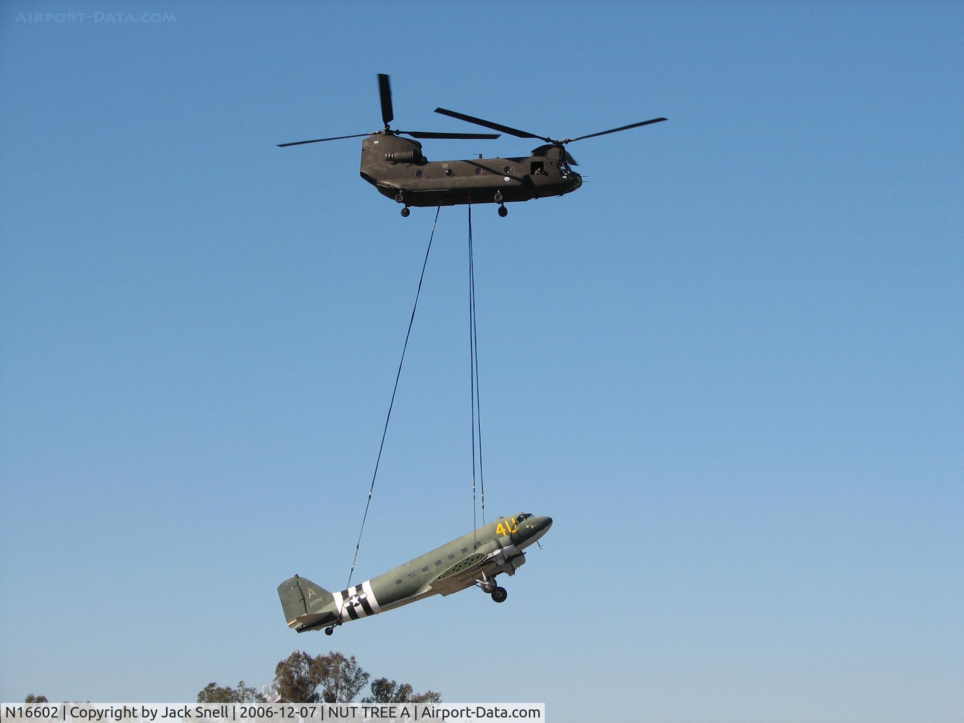 N16602, 1943 Douglas C-47A-20-DK Skytrain C/N 12852, The C-47 Successfully flown by a Califronia National Guard Boeing CH-47 Chinook helicopter to it's new home at the Travis Air Museum.  The wings and props were trucked to the museum.