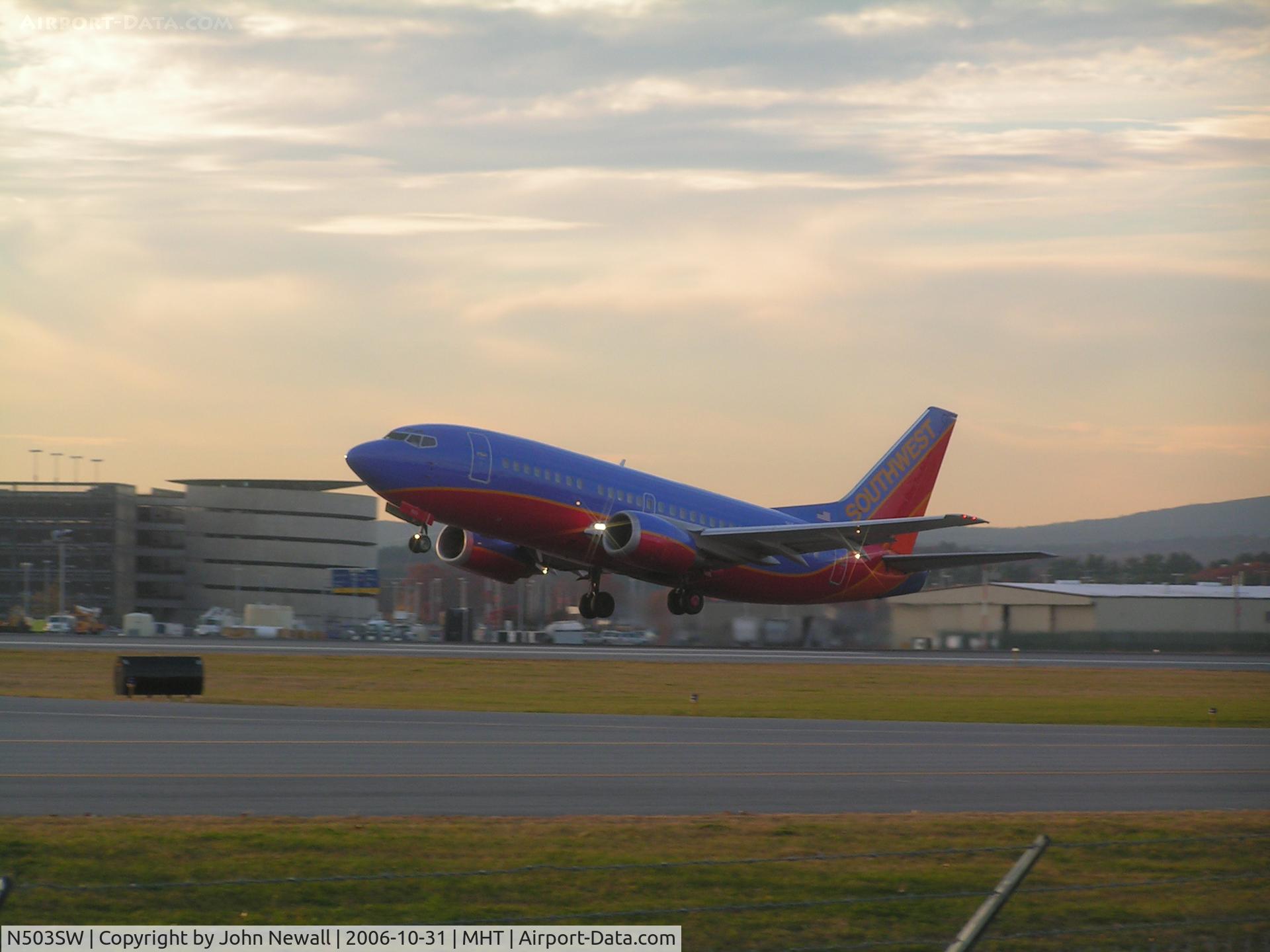 N503SW, 1990 Boeing 737-5H4 C/N 24180, late afternoon take-off from runway 17 southbound