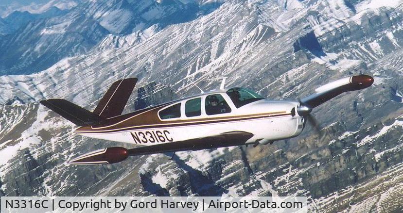 N3316C, 1954 Beech E35 C/N D3982, In Flight Over Banff Alberta