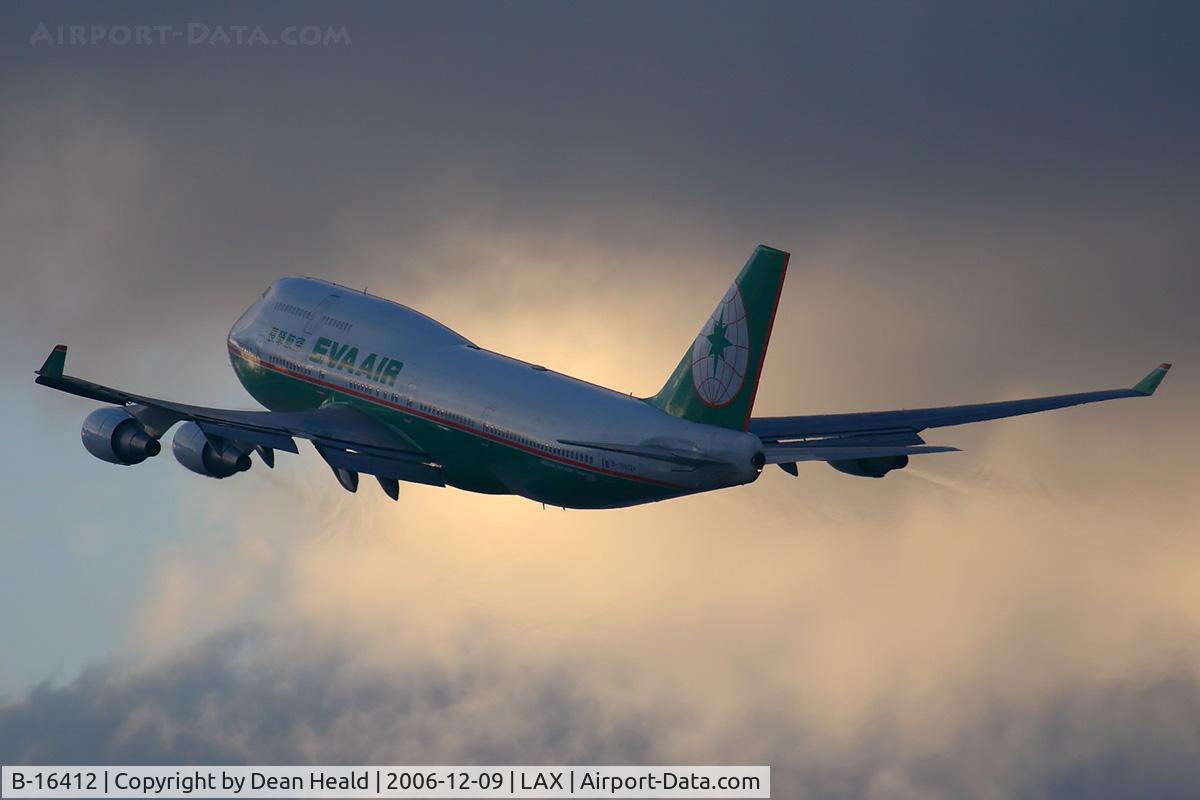 B-16412, Boeing 747-45E C/N 29112, EVA Air B-16412 (FLT EVA11) climbing out from RWY 25R on a stormy evening enroute to Chiang Kai Shek (RCTP).
